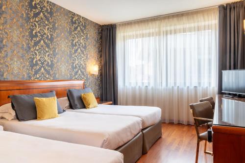 Habitación Doble Superior con cama supletoria del hotel Palace Verona. Foto 4