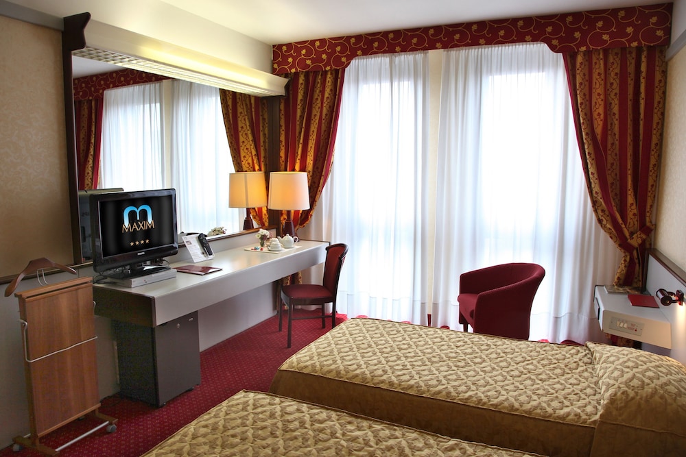 Habitación clásica con 1 cama doble o 2 individuales del hotel Maxim. Foto 1