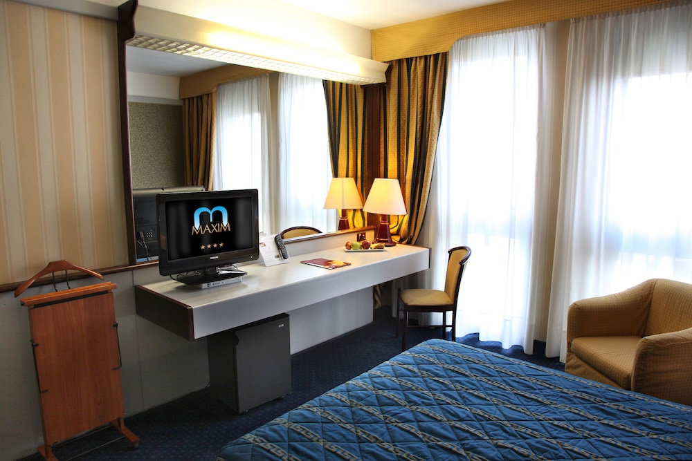 Habitación clásica con 1 cama doble o 2 individuales del hotel Maxim. Foto 3