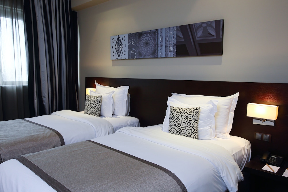 Habitación clásica con 2 camas individuales, 2 camas individuales del hotel Movenpick Casablanca. Foto 1