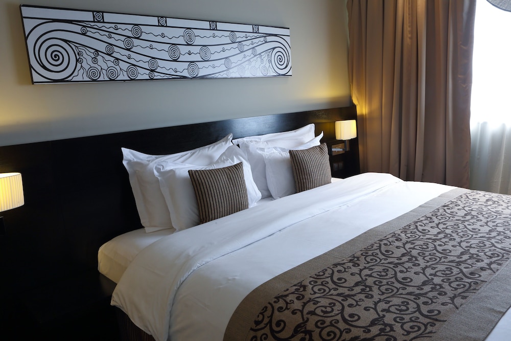 Habitación Deluxe, 1 cama de matrimonio del hotel Movenpick Casablanca. Foto 1