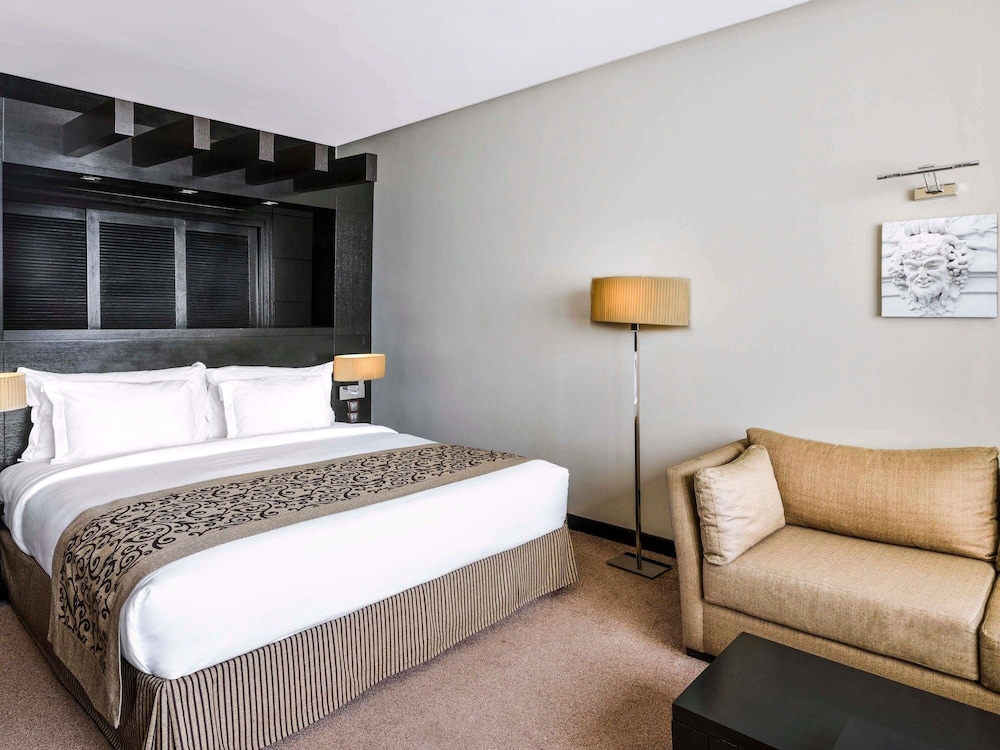 Suite junior, 1 cama de matrimonio grande del hotel Movenpick Casablanca. Foto 12