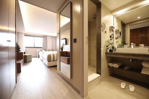 Habitación Doble Deluxe con vistas al jardín - 2 camas del hotel Kenzi Rose Garden. Foto 1