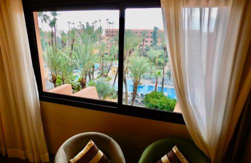 Habitación Doble Deluxe con vistas a la piscina - 2 camas del hotel Kenzi Rose Garden. Foto 4
