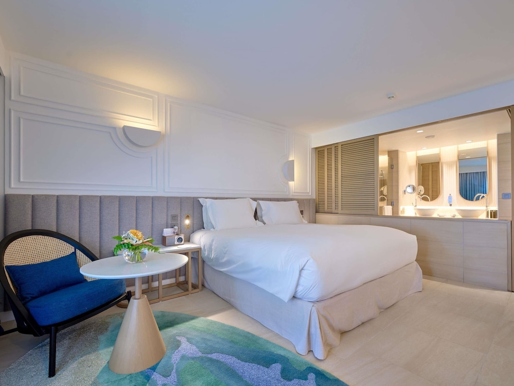 HABITACIÓN DE LUJO, 1 Cama King Size o 2 Camas Gemelas, vistas al mar y al jardín, balcón o terraza del hotel Sofitel Mauritius L'imperial Resort and Spa