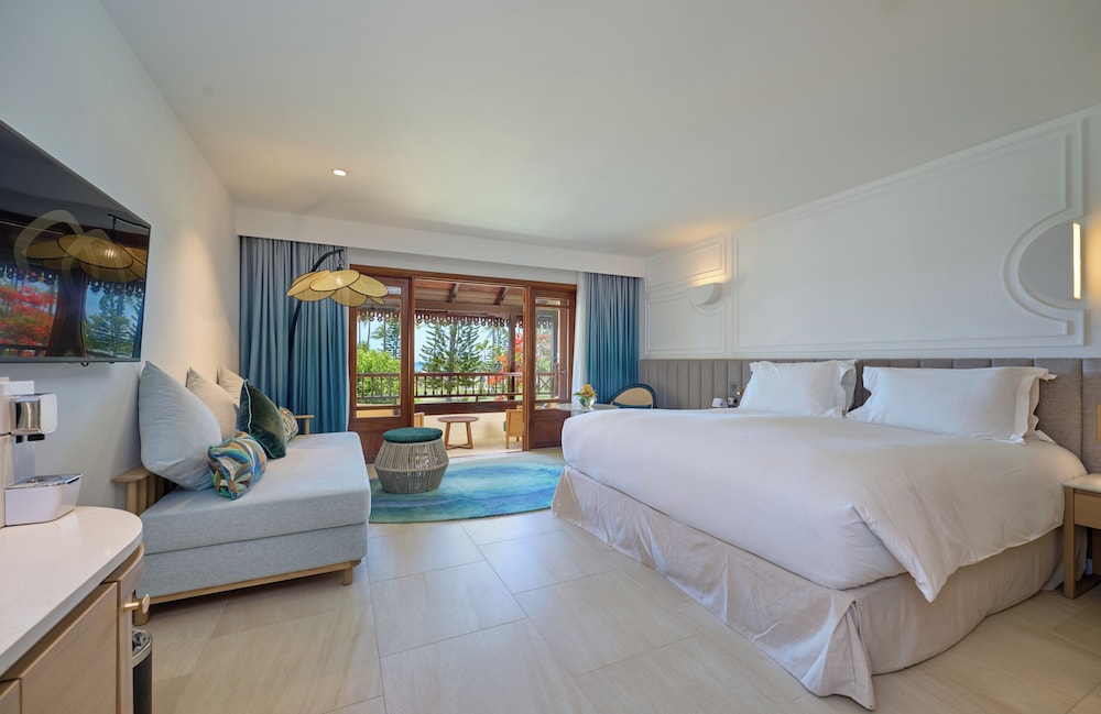 HABITACIÓN DE LUJO, 1 Cama King Size o 2 Camas Gemelas, vistas al mar y al jardín, balcón o terraza del hotel Sofitel Mauritius L'imperial Resort and Spa. Foto 2