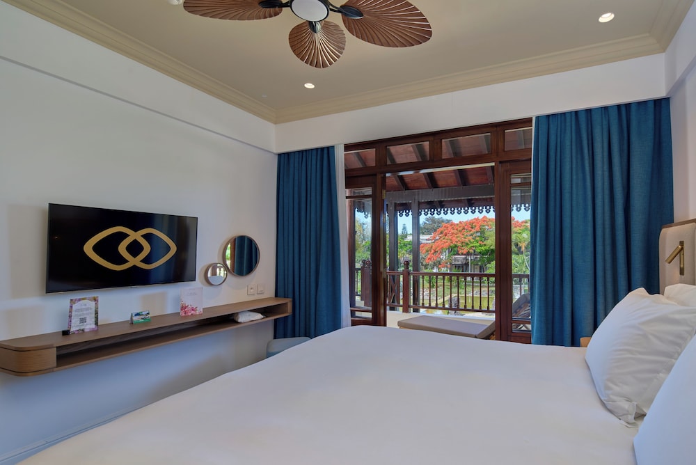 SUITE PRESTIGE, 1 Cama King Size o 2 Camas Gemelas, Suite Familiar con vistas al jardín, balcón o terraza del hotel Sofitel Mauritius L'imperial Resort and Spa. Foto 3
