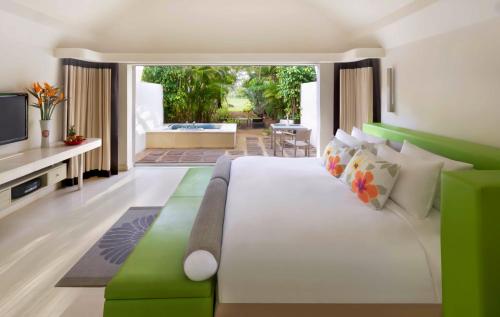 Suite SO, 1 cama King o camas gemelas, jardín privado, terraza, vistas al jardín, frente al mar del hotel So/ Sofitel Mauritius. Foto 1