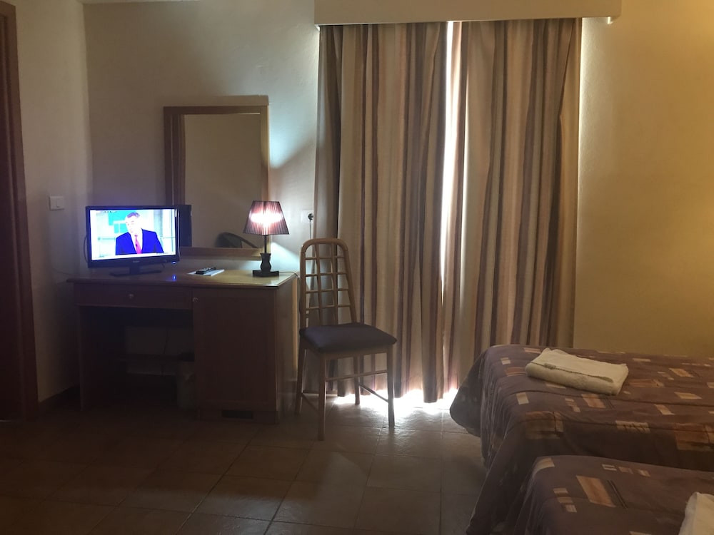 Habitación triple del hotel The Windsor