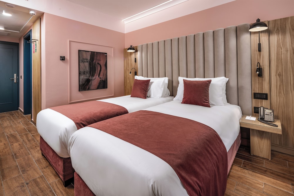 Habitación superior con 2 camas individuales del hotel Vivaldi. Foto 4
