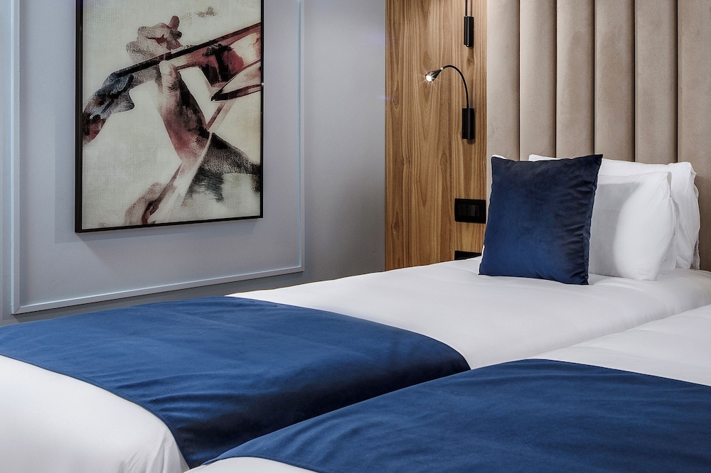 Habitación Deluxe con 2 camas individuales del hotel Vivaldi. Foto 4