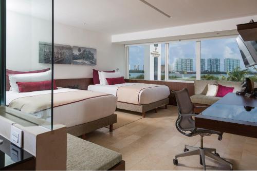 Habitación Clásica con vistas a la laguna - 2 camas grandes del hotel Intercontinental Presidente Cancun Resort, An Ihg. Foto 2