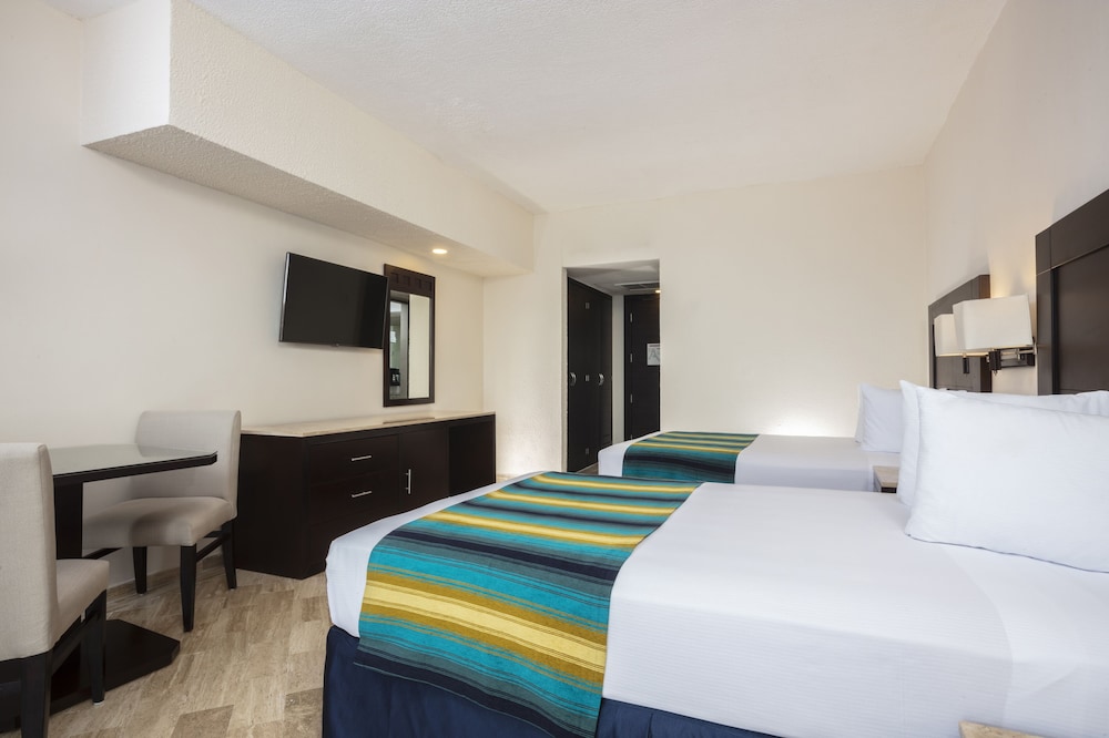 Habitación Estandar del hotel Crown Paradise Club Cancun All Inclusive. Foto 2