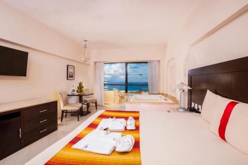 Habitación Crown Club del hotel Crown Paradise Club Cancun All Inclusive. Foto 6
