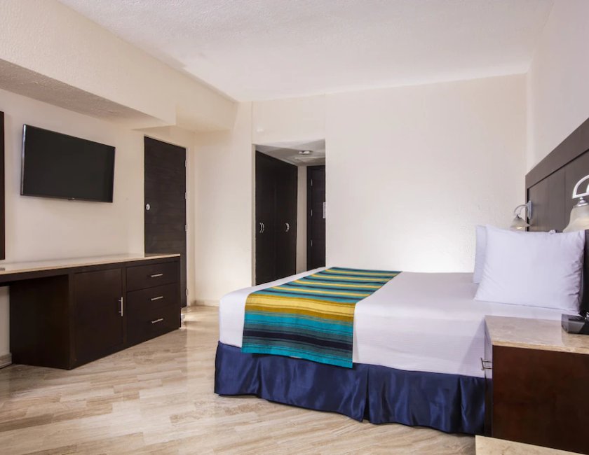 Habitación familiar Vista Parcial Mar Cama Litera 1 Cama king Con Vistas del hotel Crown Paradise Club Cancun All Inclusive. Foto 1
