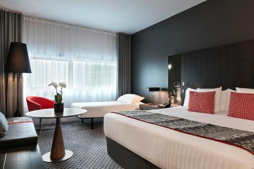 Habitación Doble Meliá del hotel Melia Paris La Defense. Foto 4