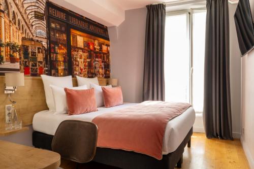Habitación Doble Confort del hotel Midnight Paris. Foto 1
