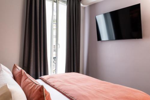 Habitación Doble Confort del hotel Midnight Paris. Foto 3