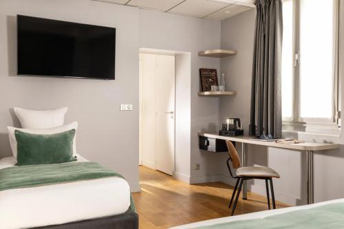 Habitación Triple Executive del hotel Midnight Paris. Foto 4