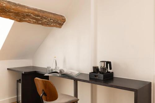 Suite Deluxe del hotel Midnight Paris. Foto 5