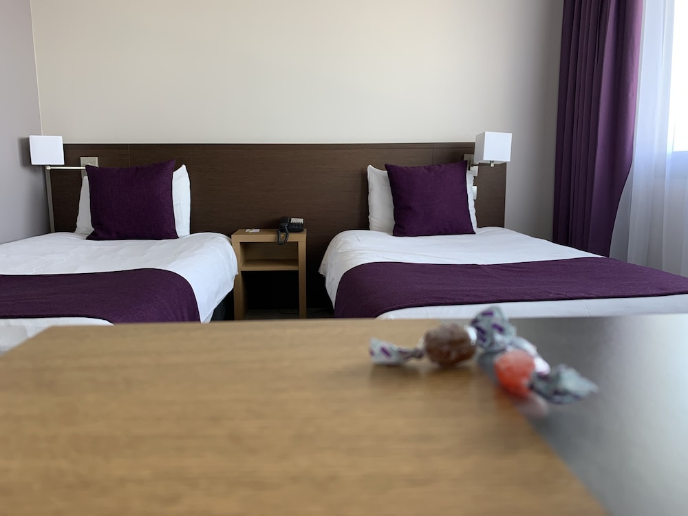 Habitación Classic - Dos camas individuales del hotel Mercure Toulouse Aeroport Golf De Seilh. Foto 3