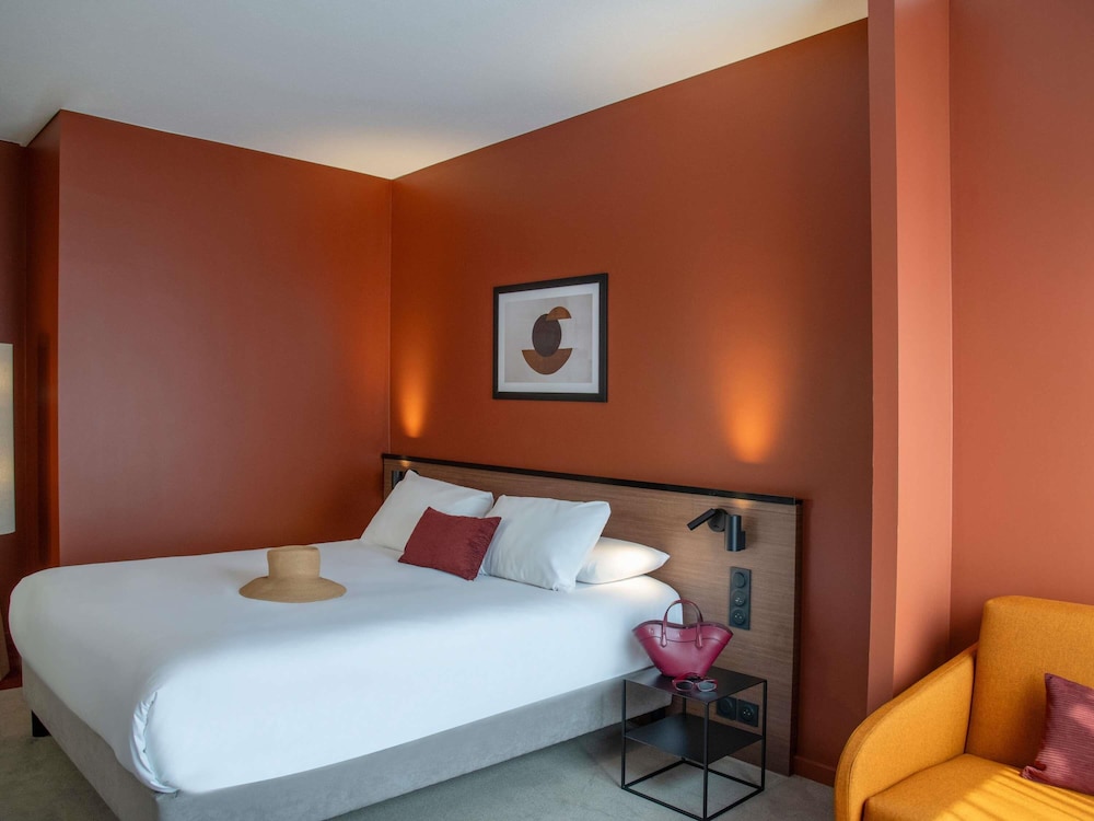 Suite Junior con 2 camas dobles del hotel Mercure Toulouse Aeroport Golf De Seilh
