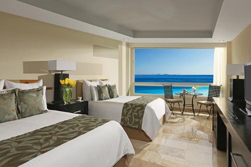 Deluxe frente al océano del hotel Dreams Sands Cancun Resort and Spa - All Inclusive. Foto 4