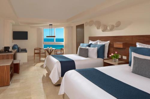 Suite Familiar del hotel Dreams Sands Cancun Resort and Spa - All Inclusive. Foto 11