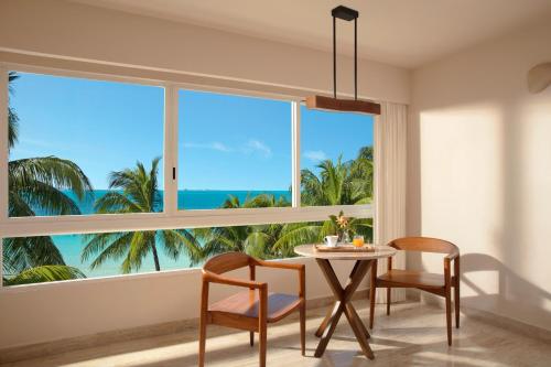 Habitación Doble Premium con vistas parciales al mar del hotel Dreams Sands Cancun Resort and Spa - All Inclusive. Foto 6