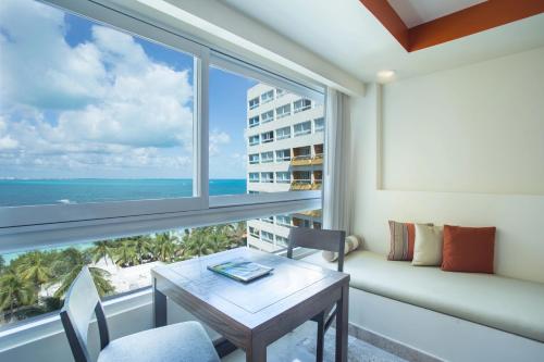 Doble Deluxe con vistas parciales al mar del hotel Dreams Sands Cancun Resort and Spa - All Inclusive. Foto 1