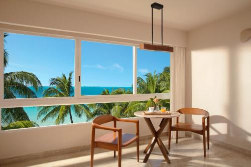 Doble Deluxe con vistas parciales al mar del hotel Dreams Sands Cancun Resort and Spa - All Inclusive. Foto 3