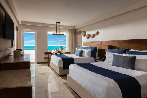 Doble Premium Preferred Club con balcón - Frente al mar del hotel Dreams Sands Cancun Resort and Spa - All Inclusive. Foto 3