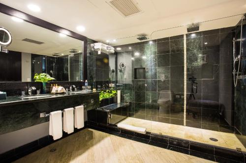 Suite Junior Preferred Club - cama extragrande del hotel Dreams Sands Cancun Resort and Spa - All Inclusive. Foto 1