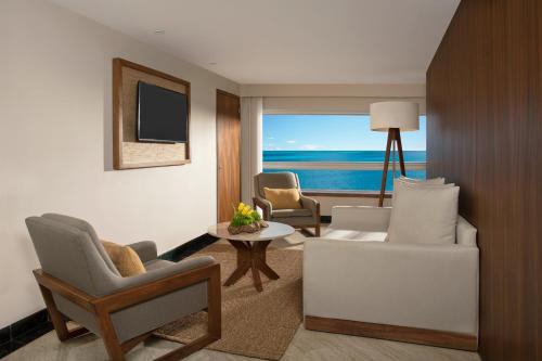 Suite Junior Preferred Club - cama extragrande del hotel Dreams Sands Cancun Resort and Spa - All Inclusive. Foto 2