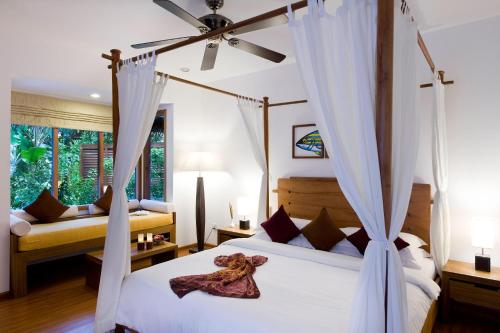 Bungalow en la playa del hotel Niva Kuramathi Maldives