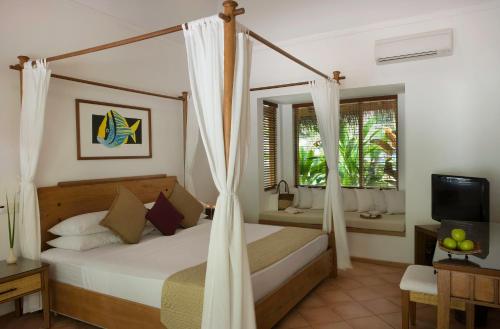 Villa Deluxe en la playa del hotel Niva Kuramathi Maldives