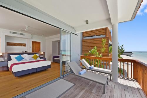 Two-Bedroom Beach House del hotel Niva Kuramathi Maldives. Foto 1