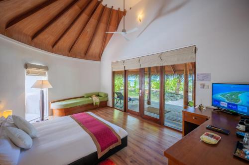 Villa Superior en la playa del hotel Niva Kuramathi Maldives. Foto 7