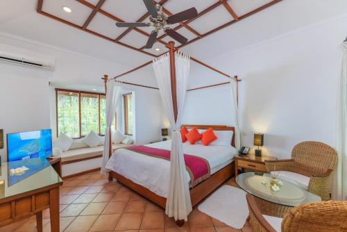 Villa Deluxe en la playa del hotel Niva Kuramathi Maldives. Foto 9