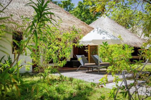 Villa Deluxe en la playa del hotel Niva Kuramathi Maldives. Foto 10