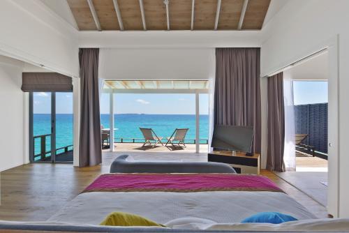 Villa de lujo sobre el agua del hotel Niva Kuramathi Maldives. Foto 9