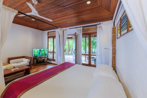 Villa Playa del hotel Niva Kuramathi Maldives. Foto 4