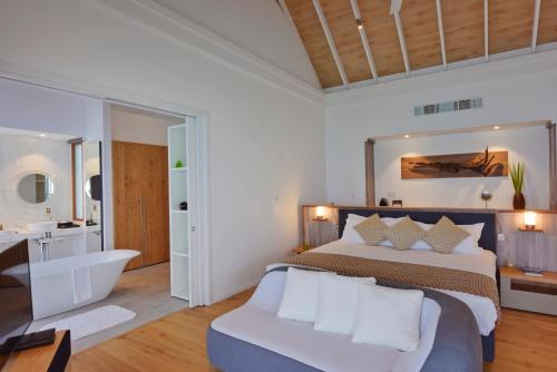 Villa Agua con piscina del hotel Niva Kuramathi Maldives. Foto 2