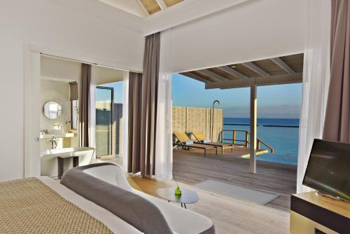 Villa Agua con piscina del hotel Niva Kuramathi Maldives. Foto 6