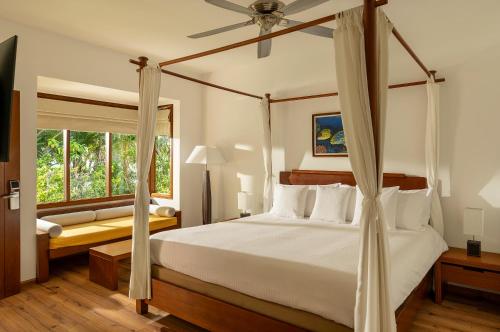 Bungalow en la playa del hotel Niva Kuramathi Maldives