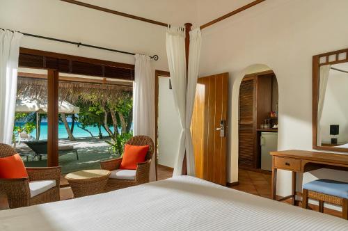 Villa Deluxe en la playa del hotel Niva Kuramathi Maldives. Foto 2