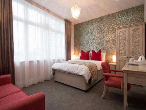 Habitación Triple del hotel W12 Rooms. Foto 2