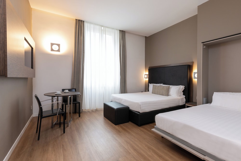 Habitación Cuádruple del hotel Rome Art