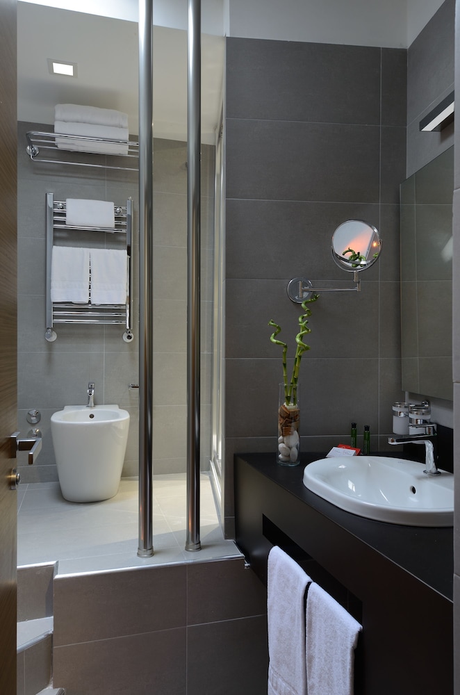Habitación Cuádruple del hotel Rome Art. Foto 4