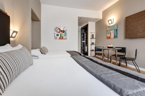 Habitación Triple del hotel Rome Art. Foto 4